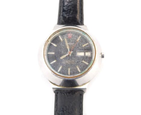 An Omega Seamaster gents wristwatch, in a raised stainless steel case, on a blue enamel dial with date aperture, and red Omeg