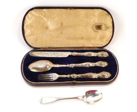 A Victorian silver three piece cutlery set, with foliate engraving, comprising knife, fork and spoon, cased, Brown &amp; Clar