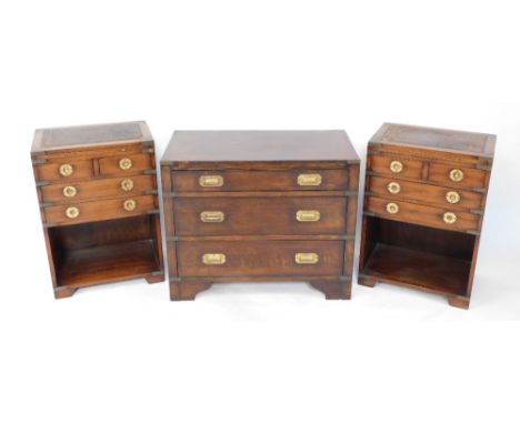 An oak military chest, of three long graduated drawers, raised on bracket feet, 61cm high, 75cm wide, 40cm deep, together wit