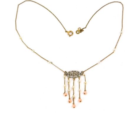 An early 20thC enamel, seed pearl and coral necklace, the shaped marquise centre with white enamel detailing, with seed pear 