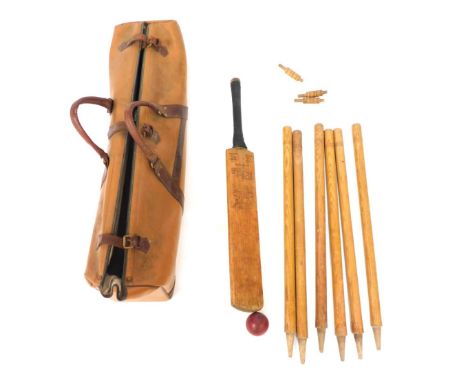 A vintage cricket set, comprising a Stuart Surridge &amp; Co, John Rose &amp; Sons of Kings Lynn cricket bat, wooden wickets,