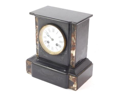 A late 19thC black slate and marble mantel clock, with chequered marble supports, and a white ceramic dial with Roman numeral
