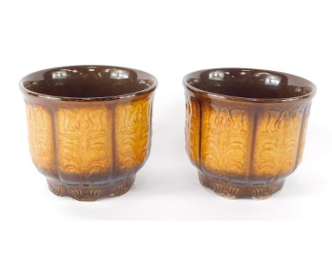 A pair of Western Germany Art Nouveau design planters, each with a brown and light brown detail, 13cm high. (2)