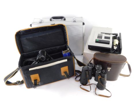 A group of camera and optics equipment, comprising a Leica P150 projector, a Sharpe Hi-8 viewcam and accessories, in carry ca