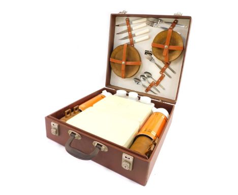 A Sirram vintage picnic hamper, in a brown carry case, with plastic plates, Thermos, box 40cm x 40cm, 13cm high.