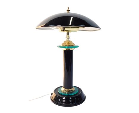 A 1960s/70s style desk lamp, in a black outer casing, with brass and green glass detail, 40cm high.