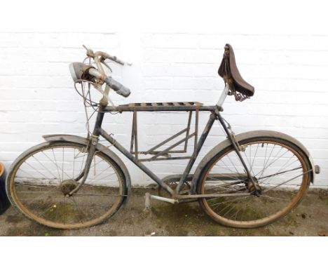 A Raleigh Sports vintage bicycle frame, with head lamp and bell.