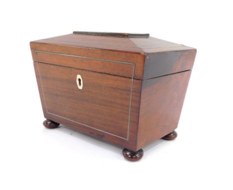 A 19thC rosewood tea caddy, the canted top with silvered line detailing and bone escutcheon, with a fitted interior, on bun f