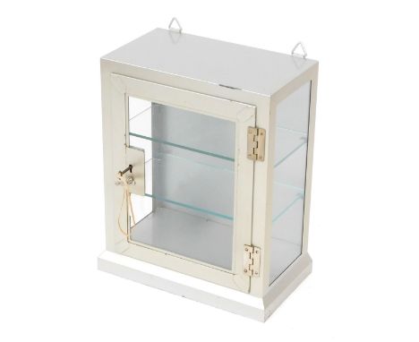 A steel glass display cabinet, with folded cornice top and single shelf, with key, 46cm high, 38cm wide, 21cm deep.