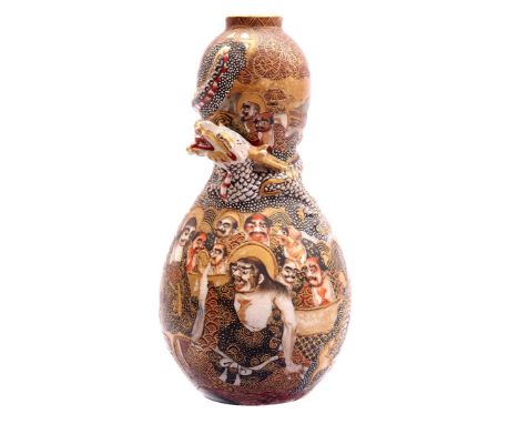 Porcelain Satsuma vase decorated with a Raku dragon and followers applied in relief with enamel, Japan early 19th century, 14