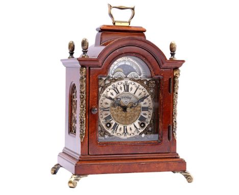 Warmink table clock with moon phase in burr walnut veneer case and brass details, 24 cm high