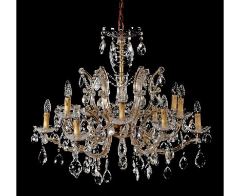 Crystal cut 12 light chandelier. 65 cm high, 75 cm diameter, incl. chain 178 cm high in total