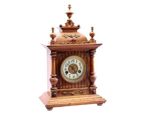 German table clock in walnut case, 44 cm high (several defects)