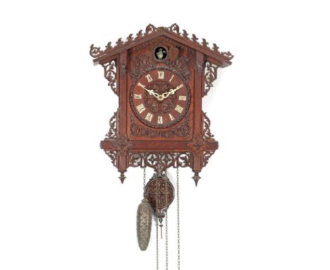 Schwarzwalder cuckoo clock with stitching in Neo Gothic style, 42 cm high, 37 cm wide (piece of stitching from hood missing)