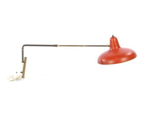Adjustable brass wall lamp with red metal perforated shade, attributed design H. Fillekes for Artiforte, Netherlands 1950s