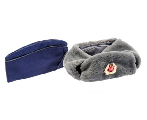 2 military headgear, period cold war, Russian Ushanka with Russian emblem in light metal and an American US Air Force Officer