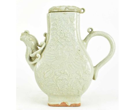 A Southern Song qingbai wine ewer. The ewer pot decorated with phoenix and peonies on the body, with a spout in form of a pho