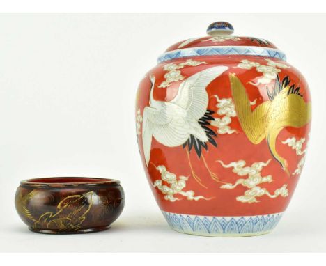 A 19th century Japanese Fukagawa polychome ceramic lidded ginger jar. The ovoid shaped ginger jar decorated with five cranes 