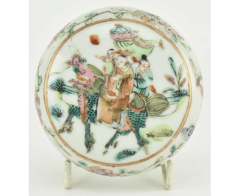 Two Qing dynasty ceramic famille rose seal boxes. The lot comprising a cirular form seal box with cover, the domed cover depi