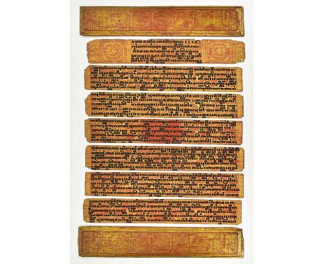 An early 20th century Burmese Pali manuscript, gilt lacquered manuscript composed of seven red lacquered and gilded enamelled