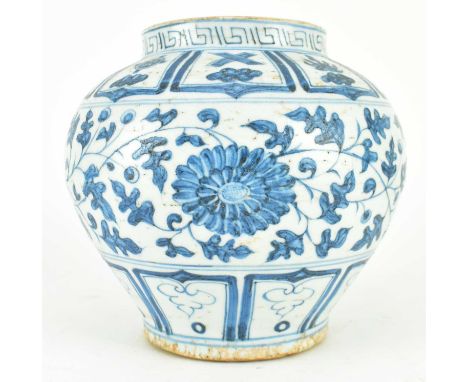 A small Yuan dynasty style blue and white ceramic jar. The baluster shaped jar decorated with fret motif on the neck, religio