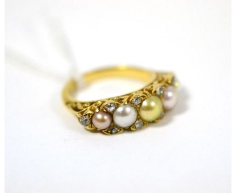 A Victorian pearl and diamond ring, the five pearls/split pearls in pink and golden hues spaced by old cut diamond accents, i