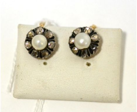 A pair of pearl and rose cut diamond cluster earrings, a pearl within a border of seven rose cut diamonds, total estimated di