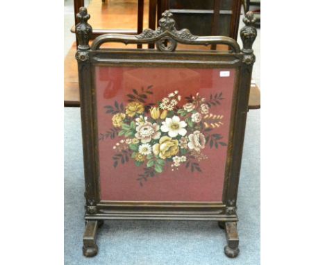 A 19th century oak fire screen 