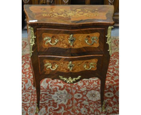 A fine French Louis XV style rosewood, Kingwood, floral marquetry and gilt metal mounted petit commode, late 19th century, of