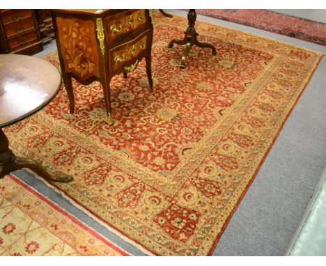 A Ziegler Mahal design carpet, North Afghanistan, the madder field of vines and arabesque enclosed by ivory of madder recipro