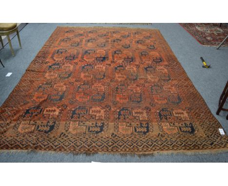 An Ersari carpet, Amu Darya region, The madder field with columns of elephant foot güls enclosed by stepped medallion borders