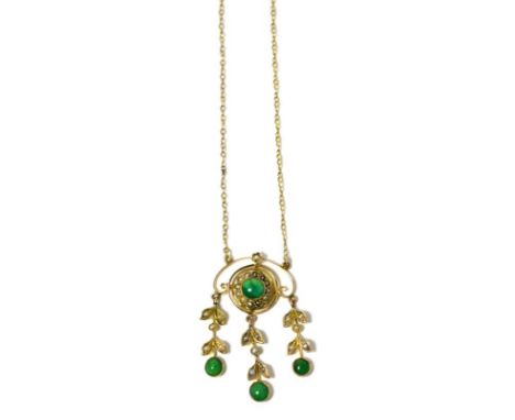 A green stone and seed pearl necklace, a central green stone cabochon within a seed pearl border, suspending three green ston