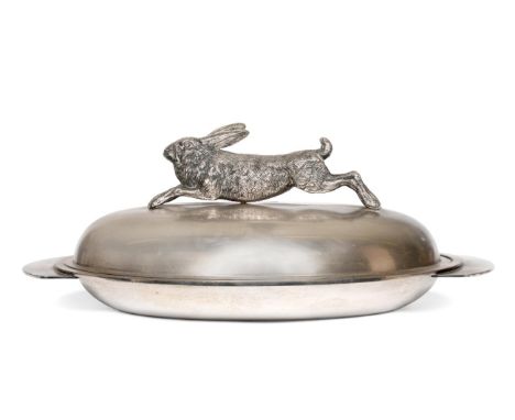 A silver plated oval serving dish surmounted with a hare handle Overall 45.8cm wide, 28.6cm deep. Ceramic dish to interior 34