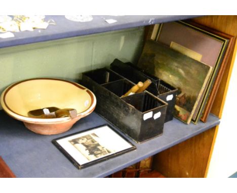 Two toleware letter holders, a 19th century redware pottery cream bowl, two treen spoons and a treen sifter scoop, Deverald o
