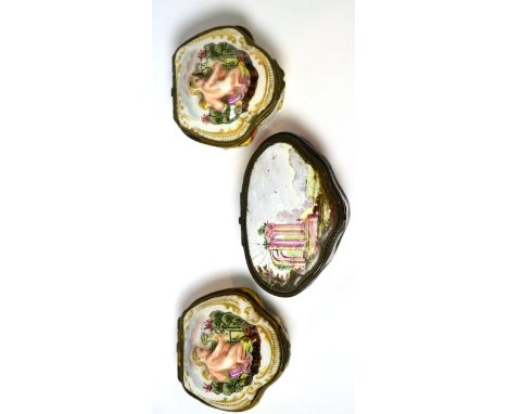 A pair of Naples porcelain patch boxes and a Bilston enamel patch box (3)
