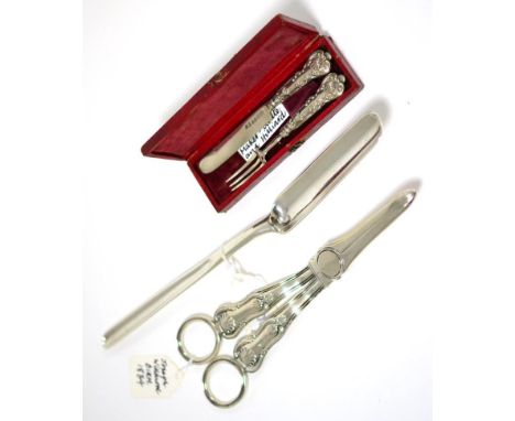 A pair of silver grape scissors, a silver marrow scoop and a cased silver Christening knife and fork 
