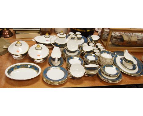 A Royal Doulton eight-place setting tea and dinner service in the Earlswood pattern, H5053