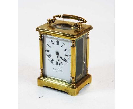 An early 20th century lacquered brass cased carriage clock by Mappin &amp; Webb Ltd, height 12cm (handle down)