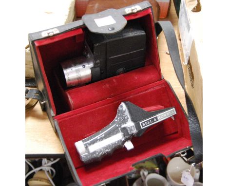 A Bell &amp; Howel Combat  Zoom hand-held cine-camera, cased; together with a Kodak automatic 8 cine-camera, in polystyrene b