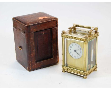 A circa 1900 French lacquered brass carriage clock having visible platform escapement, single barrel going 8 day movement, he