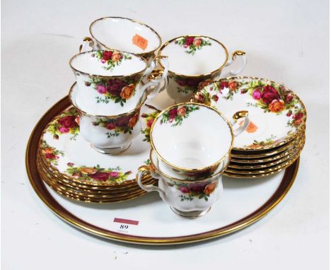 A Royal Albert Old Country Roses part tea service; together with a porcelain tea tray 