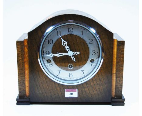 A 1930s oak cased mantel clock, the chapter ring showing Arabic numerals, 8-day movement with Westminster chimesCondition rep