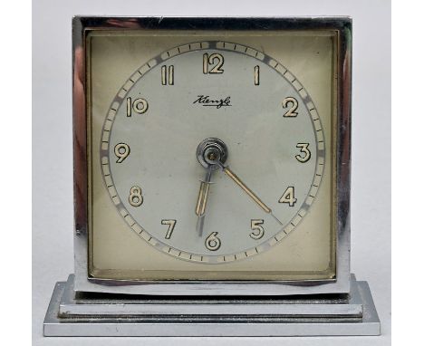 Wecker, Deutschland, 2. H. 20. Jh. Bezeichnung auf dem Zifferblatt: Kienzle, Zifferblatt mit arabischen Ziffern und modernen 