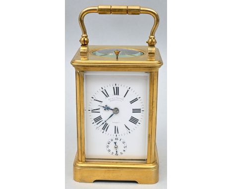 Reiseuhr, Mitte 19. Jh. Metallgehäuse, vergoldet, allseitig mit facettiert geschliffenen Glasscheiben verglast. Tragebügel. E
