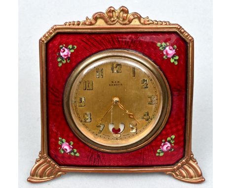 Kleine Tischuhr, Schweiz, E.19./ Anf. 20. Jh. Hübsch emaillierte Front in rotem Guilloche-Emaille mit aufgemalten Röschen. Kr