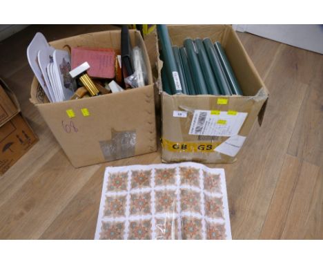 Two boxes of trophies and rolls of Celtic style stickers