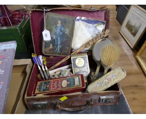 Suitcase of vintage items, dressing table set, table cutlery, darts, tins, trinkets etc
