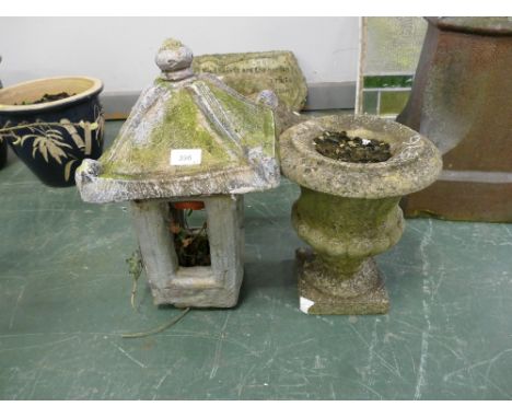 Two  composite garden ornaments, one urn form