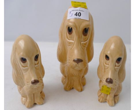 Three Sylvac sad dog figures, models 2951 and 2950