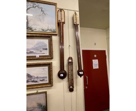 Two stick barometers and thermometer (3).